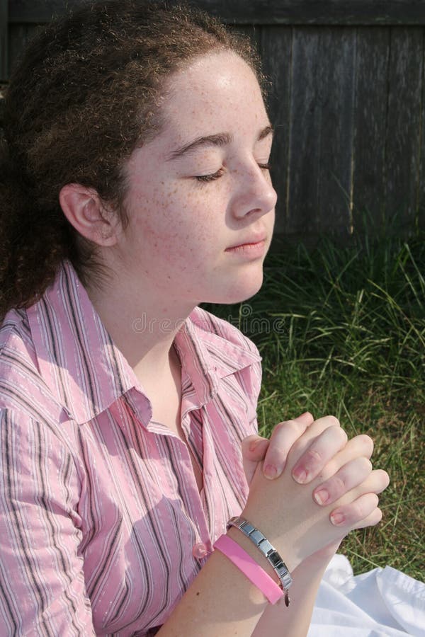 Cute Teen Praying 2 royalty free stock image