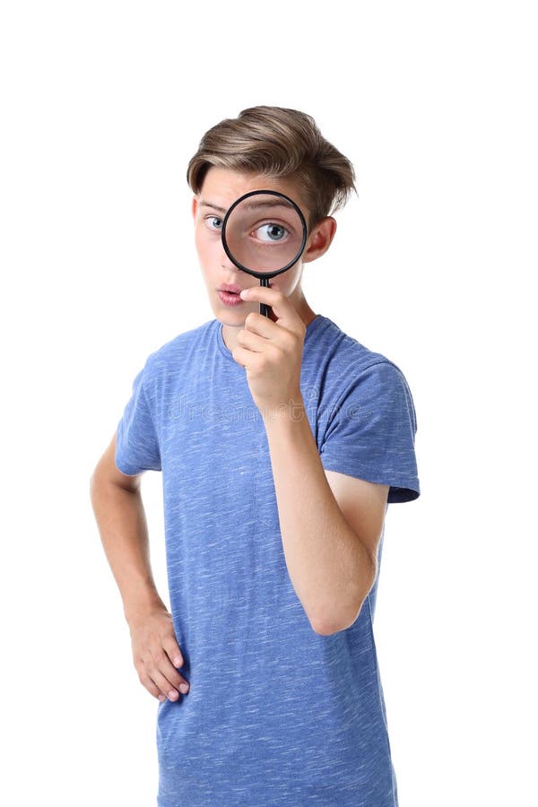 Teenager with magnifying glass