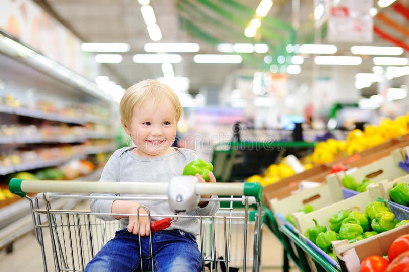 Cute Toddler Boy Sitting in a Supermarket Stock Image - Image of ...