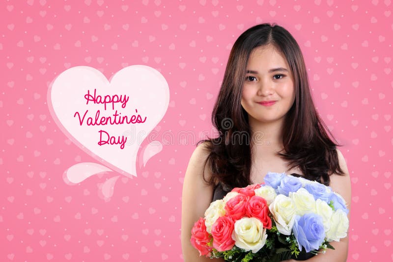 Happy Valentines Day background design with portrait of cute Asian teenage girl holding colorful roses bouquet on pink. Happy Valentines Day background design with portrait of cute Asian teenage girl holding colorful roses bouquet on pink