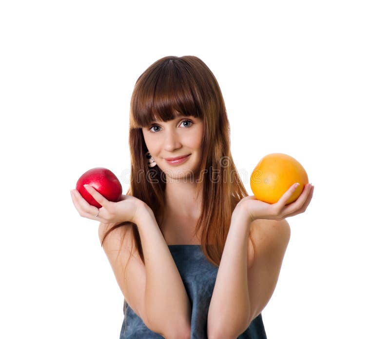 Cute woman hold apple and orange