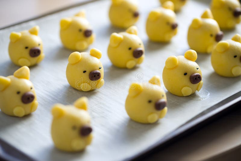 Cute yellow pig cookie on tray royalty free stock photo Cute yellow pig cookie on tray royalty free stock photo