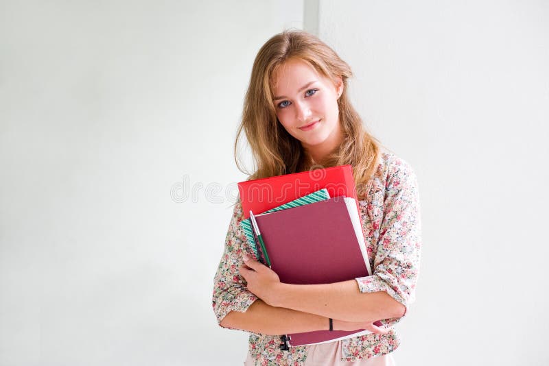 Cute young blond student girl. royalty free stock image