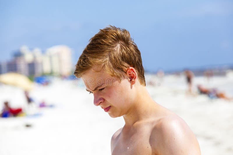 Teenager Boy Running in Wet Clothes on Beach Stock Image - Image of landscape, a
