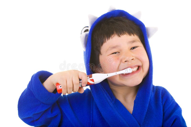 Cute young boy with great smile brushing teeth stock photo Cute young boy with great smile brushing teeth stock photo
