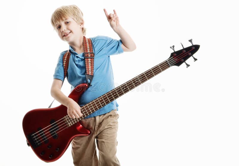 Cute Young Boy Playing An Electric Guitar Royalty Free Stock
