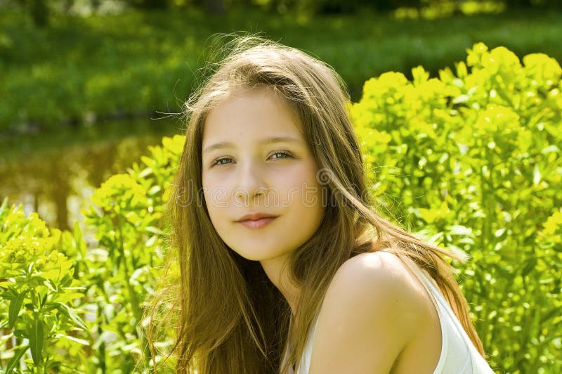 Cute young girl in a park stock photo. Image of healthy - 7477420