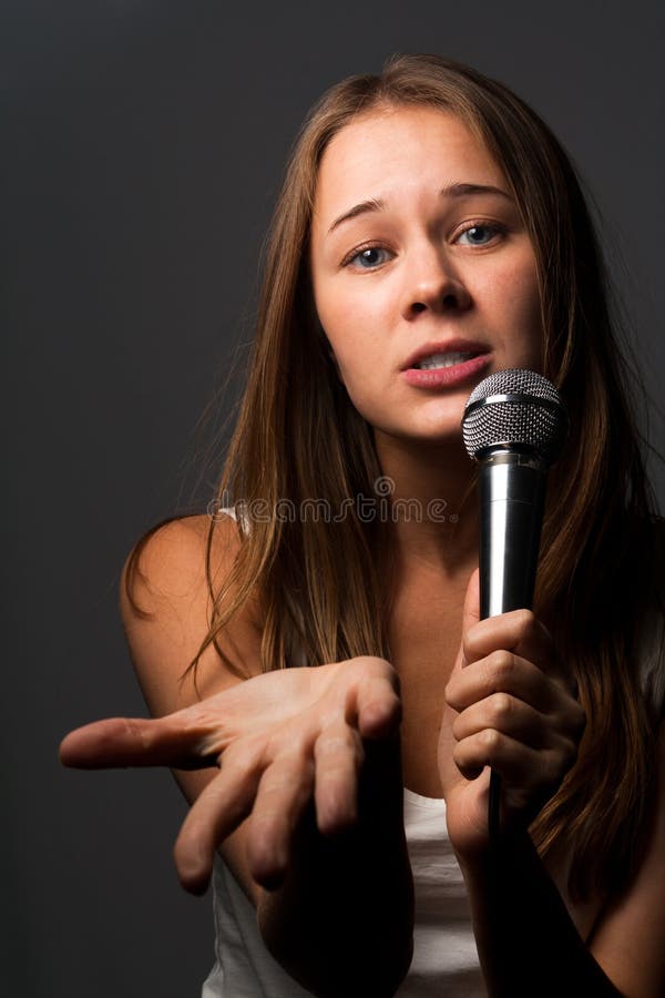 Cute young girl singing royalty free stock photos Cute young girl singing royalty free stock photos