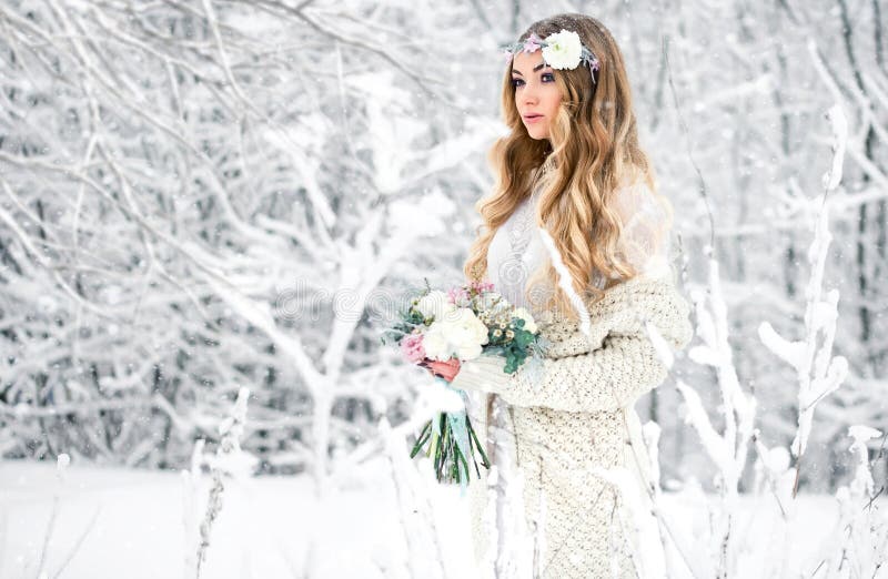 Cute Young Girl in Winter Snow Forest Outdoors with Beautiful Flowers ...