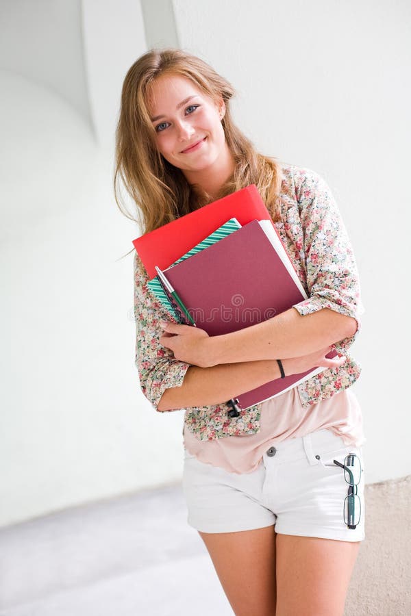Cute young student girl stock image