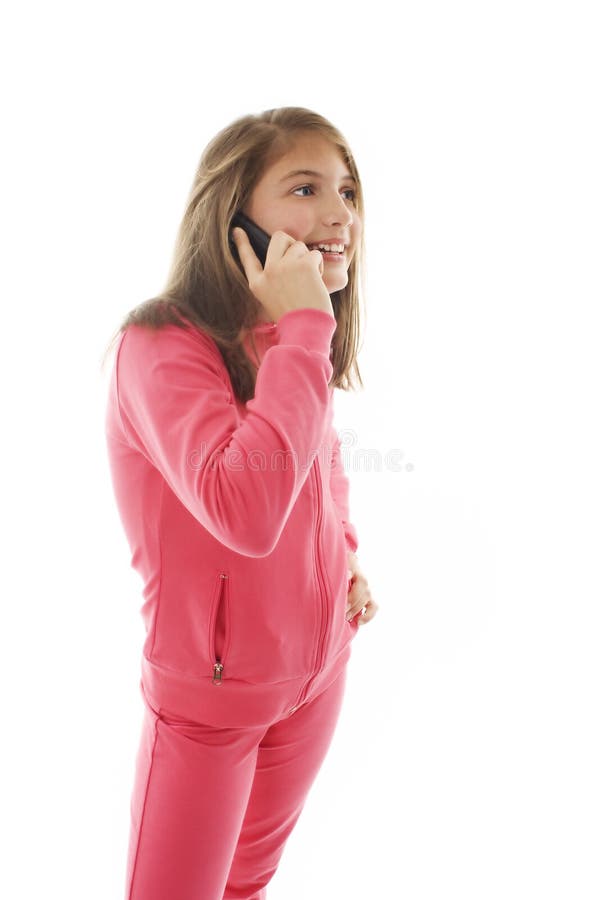 Cute young teenage girl talking on a cellphone