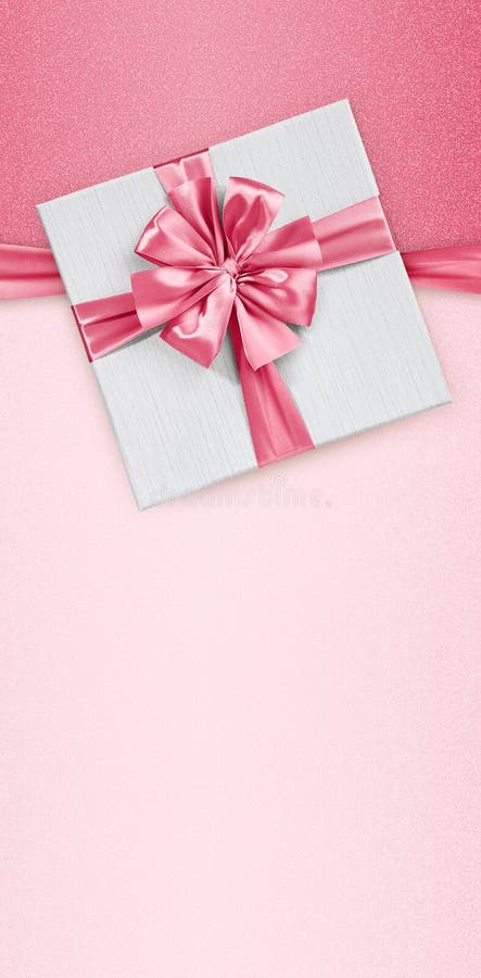 Cutie cu card pentru ziua mamelor cu panglică strălucitoare, roz, cu formă de model alb, strălucitor, cu formă de model alb, cu fo stock images