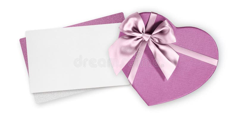 Cutie cu formă de card cadou de o zi pentru mame, cu panglică lucioasă și roz și cu un bilet alb alb-negru cu spațiu de copiere iz stock photography