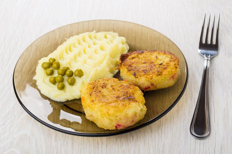 Cutlets from Cabbage with Mashed Potato, Green Peas and Fork Stock ...