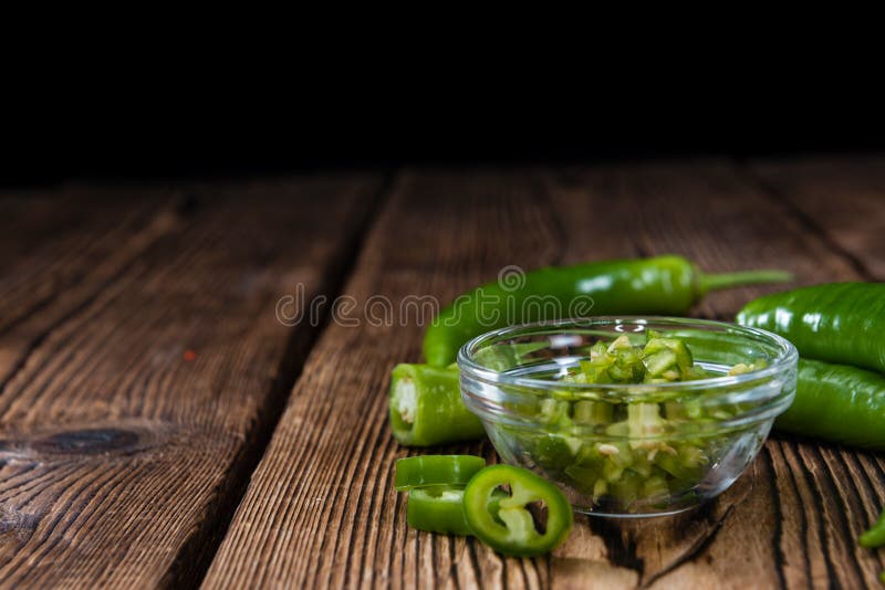 Green Chilis (cutted) stock image. Image of ground, chilies 53282497