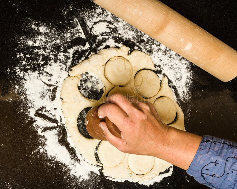 Cutting Biscuits from Rolled Dough Stock Photo Image of bake, cutter