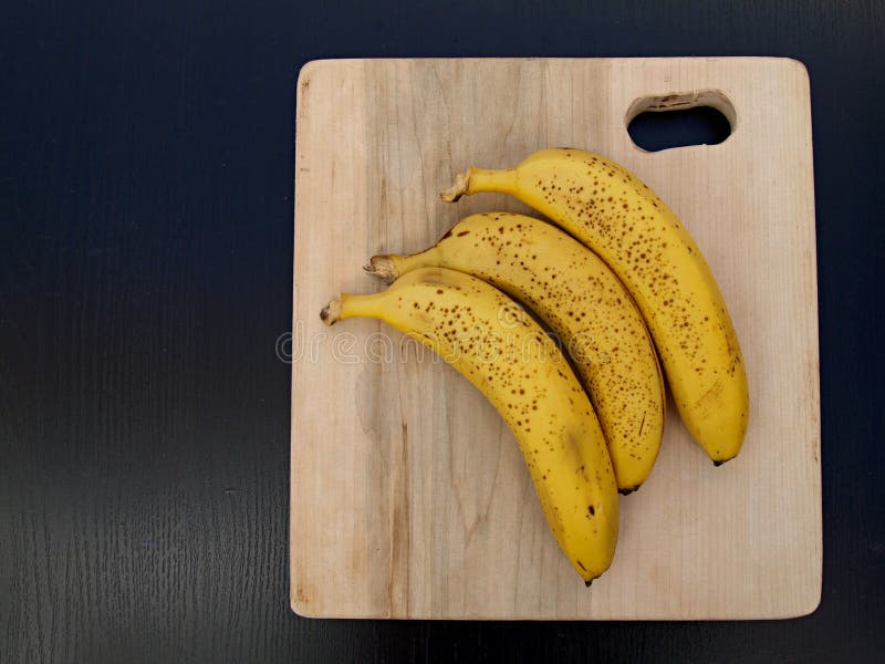 Cutting bananas stock image. Image of wooden, food, banana 5202189