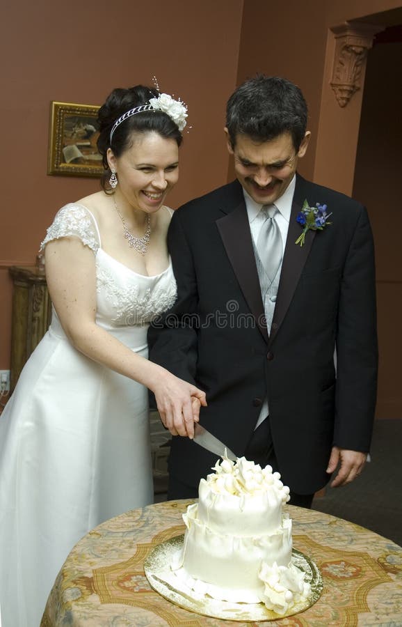 Newlywed Couple Cutting Cake Stock Photo Image of portrait, marriage