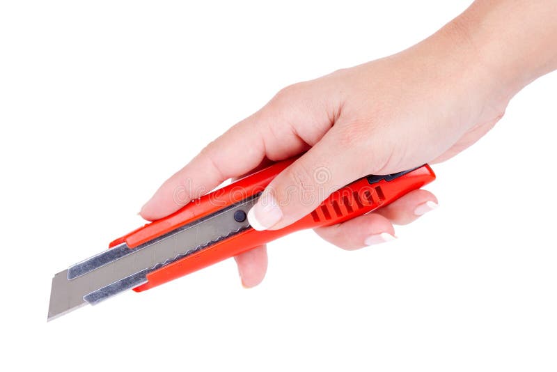 Cutting with a cutter royalty free stock photo