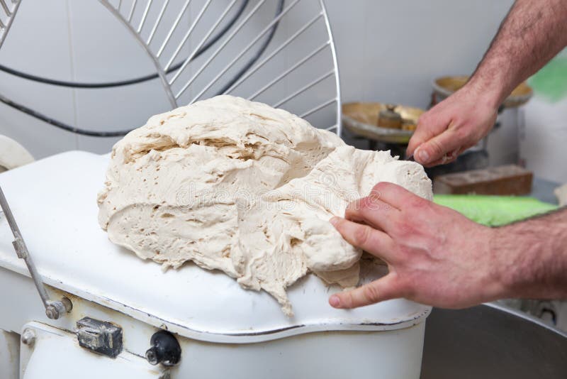 Cutting dough for bread stock photo. Image of machine 51072694