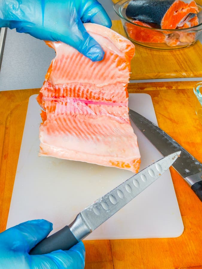 Cutting Fish in the Kitchen. Stock Image Image of culinary, kitchen 221530813