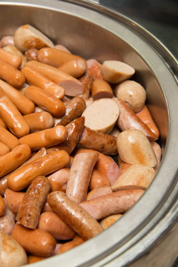 Cutting German Sausage and Meat in Dish Stock Photo Image of pork
