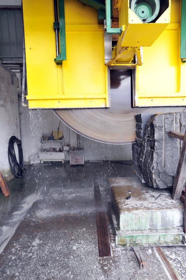Cutting granite stone stock image. Image of industry 20486545