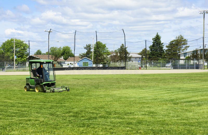 Cutting the Grass of Playing Field Stock Photo Image of outdoors