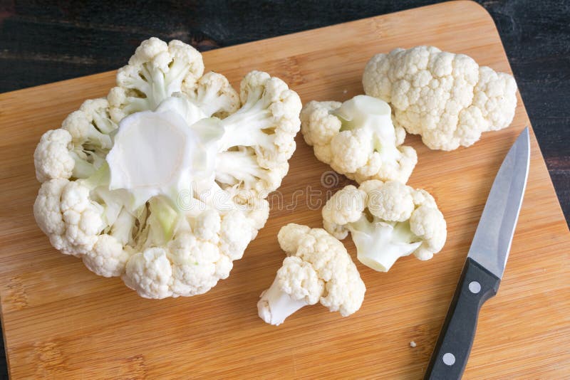 Cutting a Head of Cauliflower into Florets Stock Photo Image of kitchen, flesh 179311784