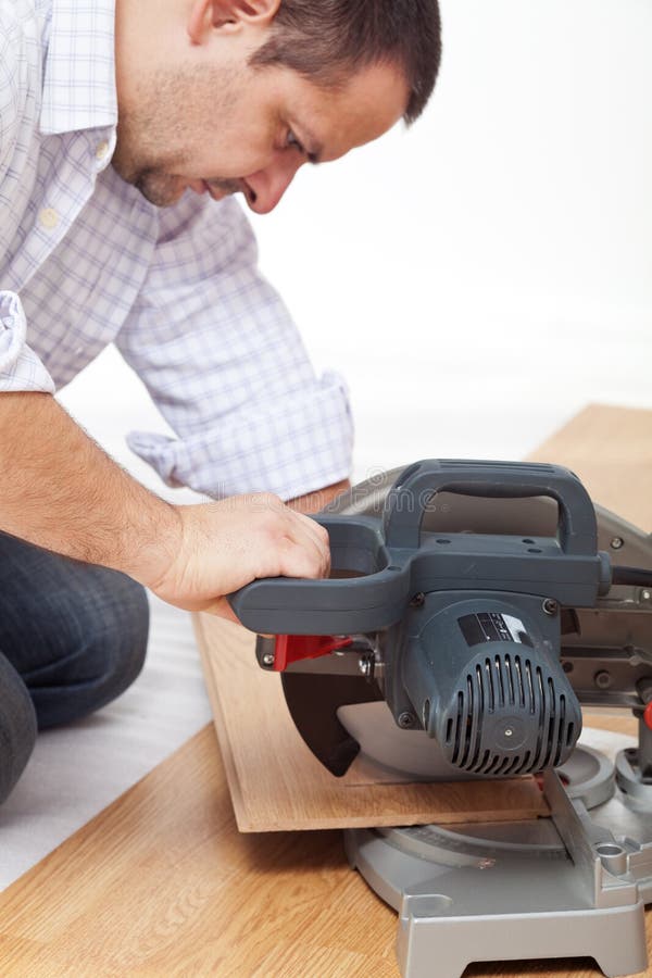 Cutting the Laminate Flooring Planks Stock Image Image of