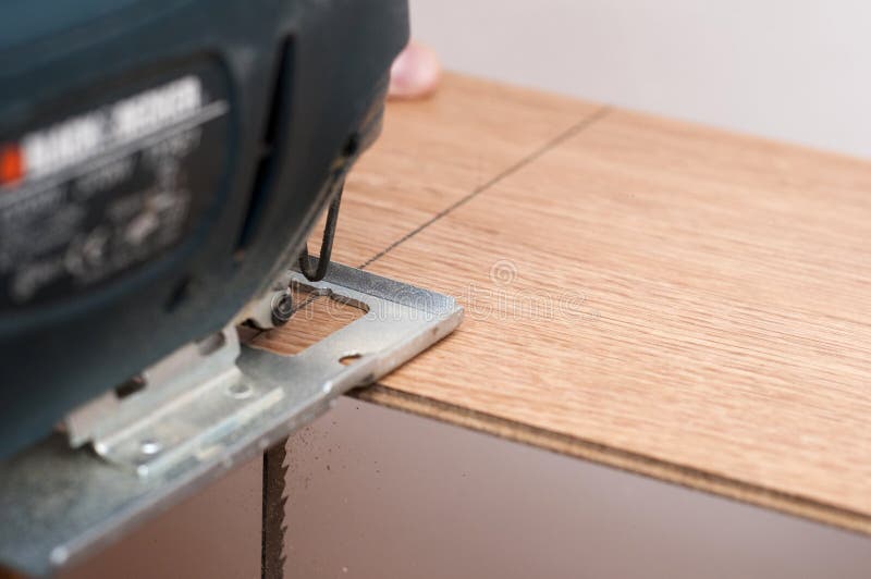 Cutting a Laminated Floor Board Stock Image Image of renovation