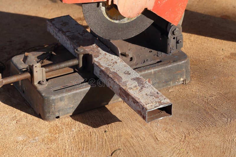 Cutting a Metal and Steel with Compound Mitre Saw with Sharp Stock