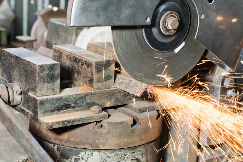 Cutting Steel Pipes. an Angle Grinder with Cutting Disc for Steel is in