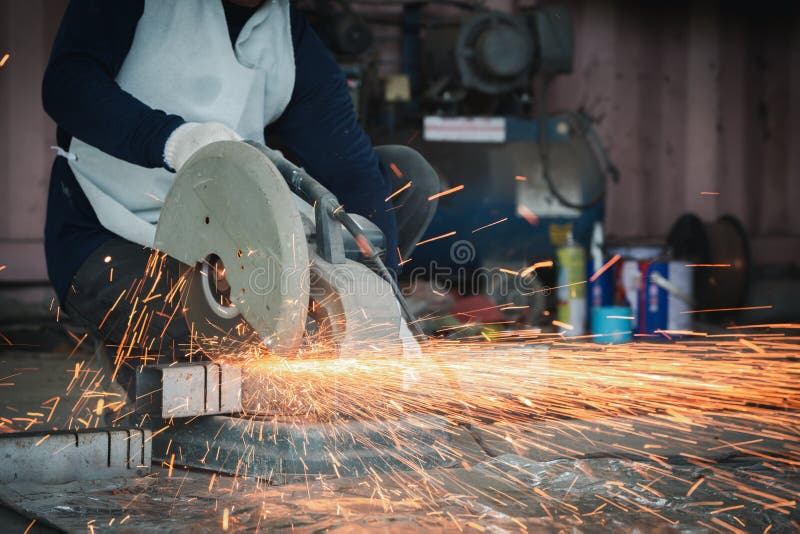 Cutting of a Steel with Splashes of Sparks, Metal Processing with Angle