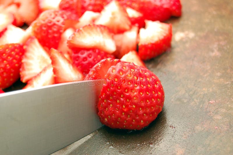 Cutting Strawberries stock image. Image of blade, silver 18433101