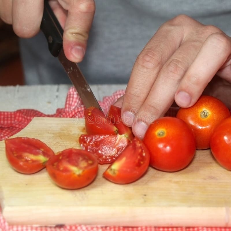 Cutting Tomatoes stock photo. Image of depth, preparation 79922638
