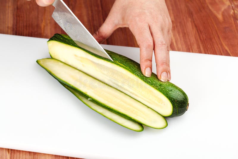 Cutting zucchini stock image. Image of kitchen, cuisine 51457707