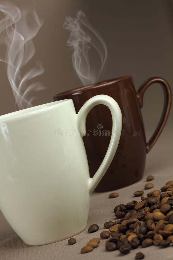 Coffee cup and coffee beans. Coffee cup and coffee beans
