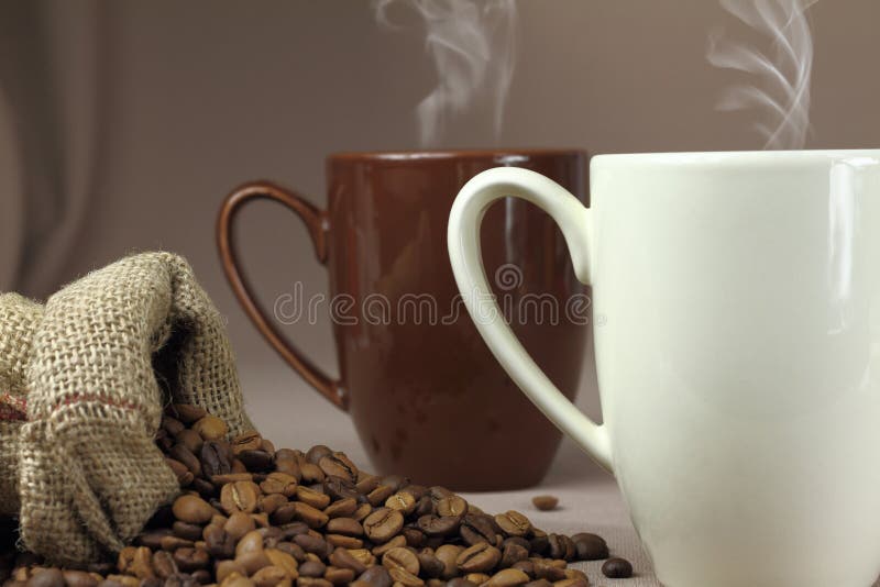 Coffee cup and coffee beans. Coffee cup and coffee beans