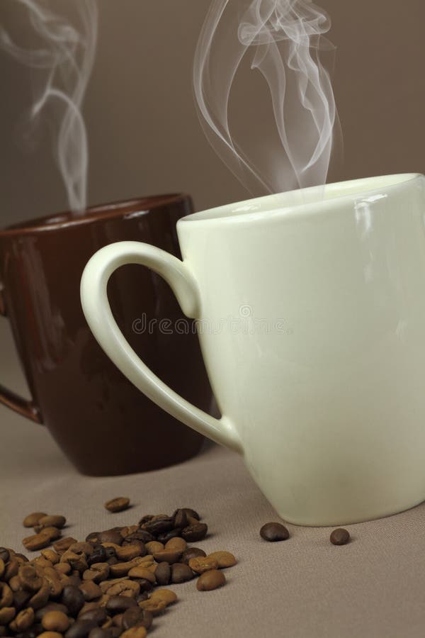 Coffee cup and coffee beans. Coffee cup and coffee beans