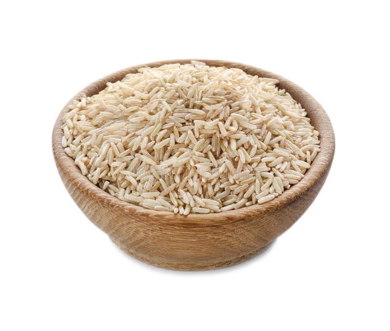 Cuvette en bois avec du riz brun d'isolement sur le blanc photographie stock libre de droits