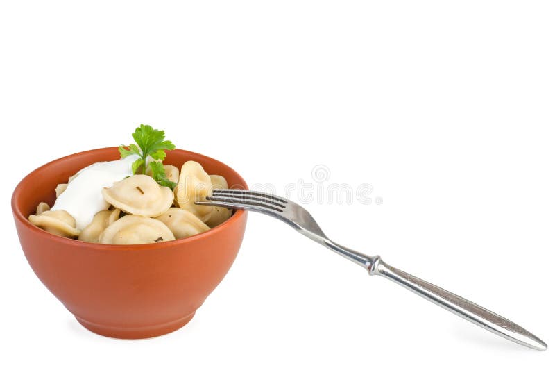 Cuvette en céramique avec des boulettes de viande, et fourchette près image libre de droits Cuvette en céramique avec des boulettes de viande, et fourchette près image libre de droits
