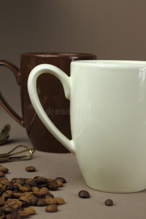 Coffee cup and coffee beans. Coffee cup and coffee beans