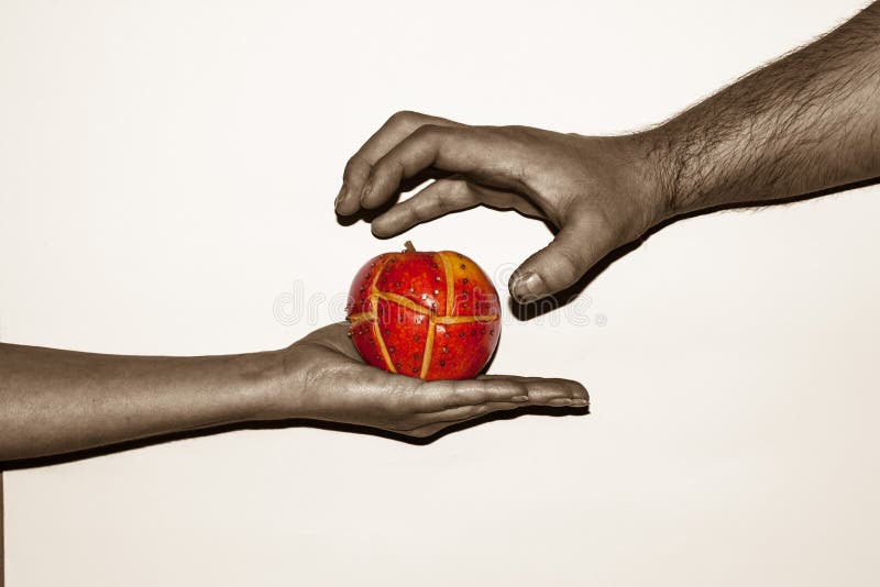 Human hands with apple
