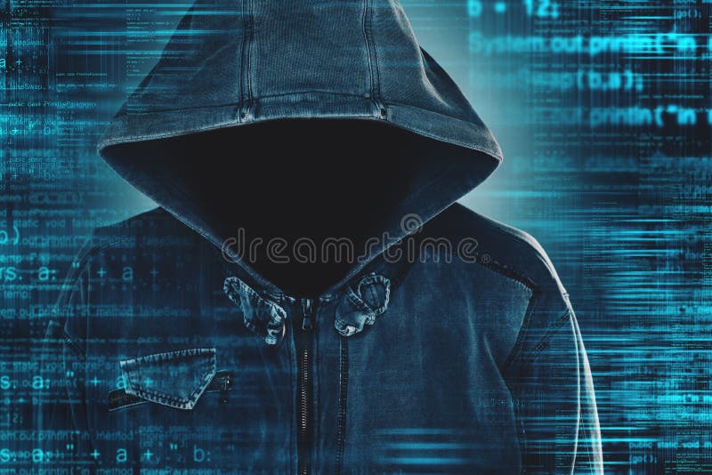 Cybersecurity, computer hacker with hoodie royalty free stock photography