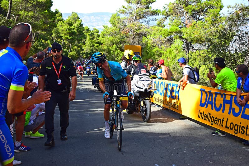A Cycle Racer Looking Behind La Vuelta España Cycle Race stock image A Cycle Racer Looking Behind La Vuelta España Cycle Race stock image