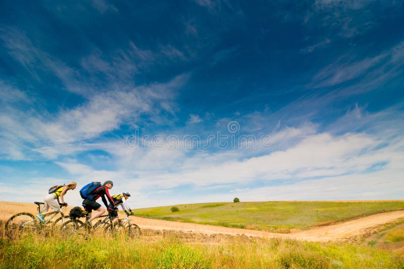 Cyclists relax biking outdoors