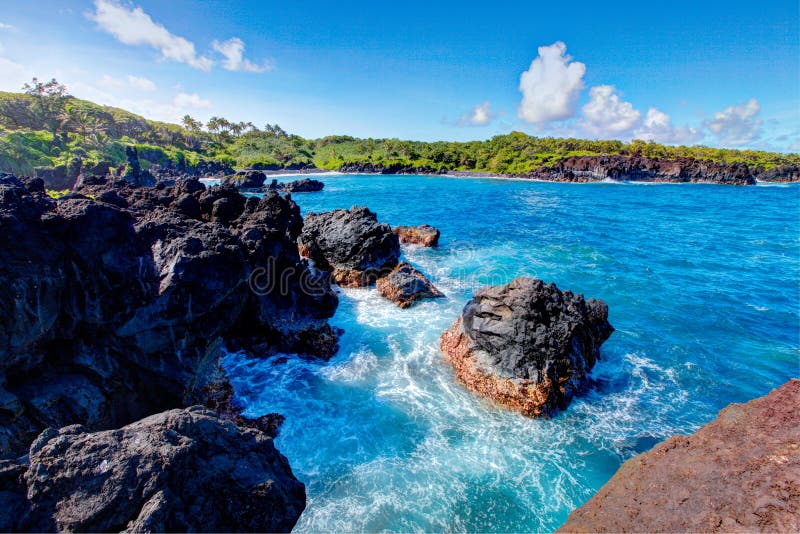 Black lava rock beach, road to Hana, Maui, Hawaii. Black lava rock beach, road to Hana, Maui, Hawaii