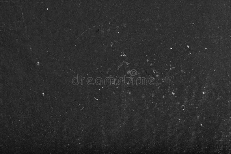 Czarne, pyłowe tło abstrakcyjne Tekstura papieru z czarnego papieru Tablica teksturowana Grungy