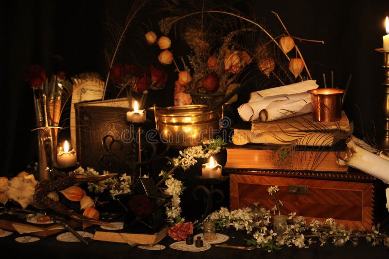 Still life Witchcraft composition with candles, crystal, magic book and pentagram symbol. Halloween and occult concept, black magic ritual. Still life Witchcraft composition with candles, crystal, magic book and pentagram symbol. Halloween and occult concept, black magic ritual.